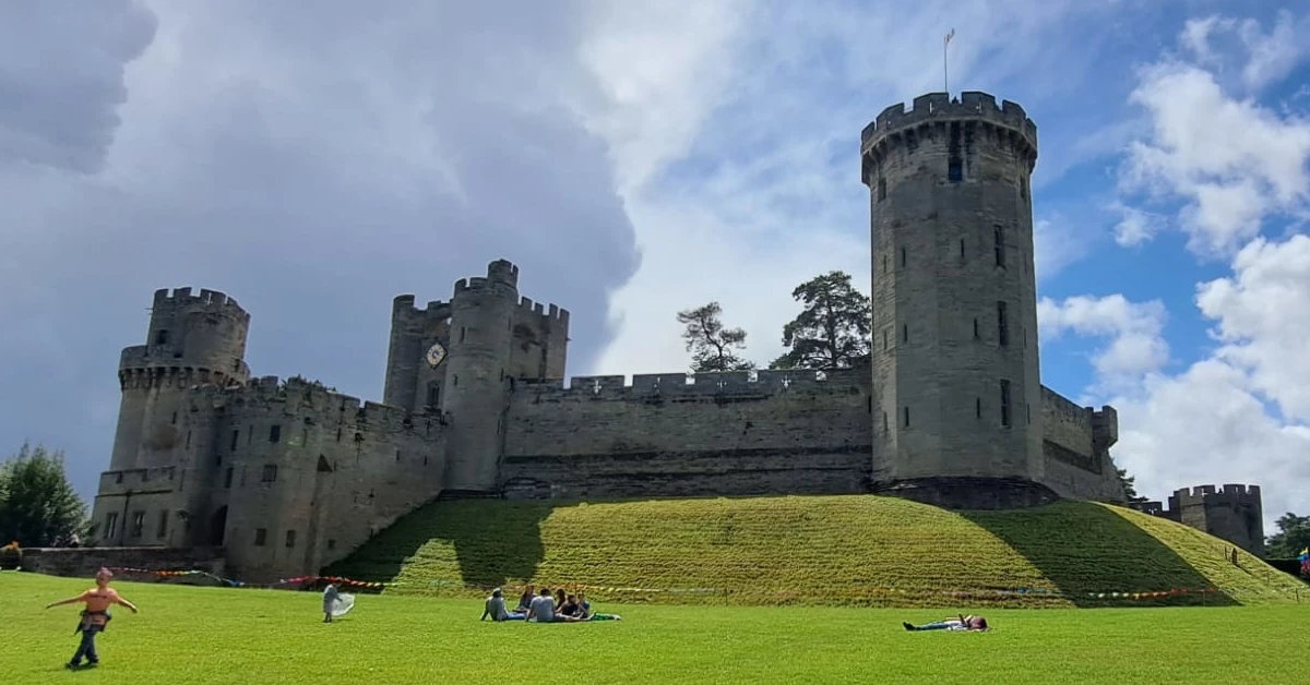 Historic Warwick Castle towering over the river